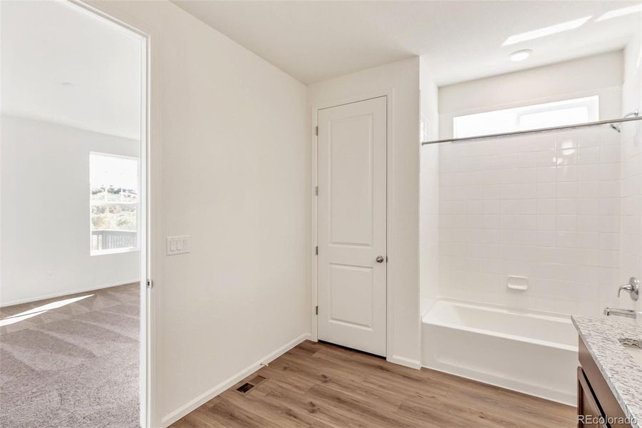 Spacious, unfurnished interior of a new home in Terrain Oak Valley, Castle Rock (Image 27).