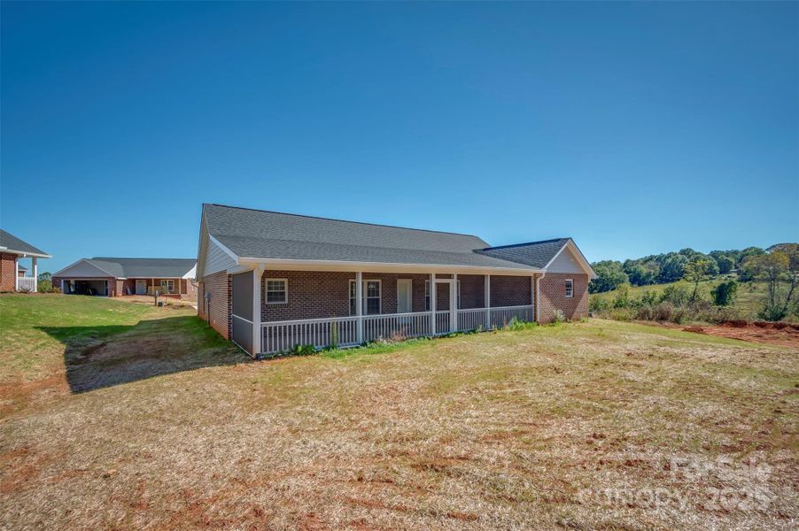 Exterior details and patio area of a home in , Spindale (Image 4).
