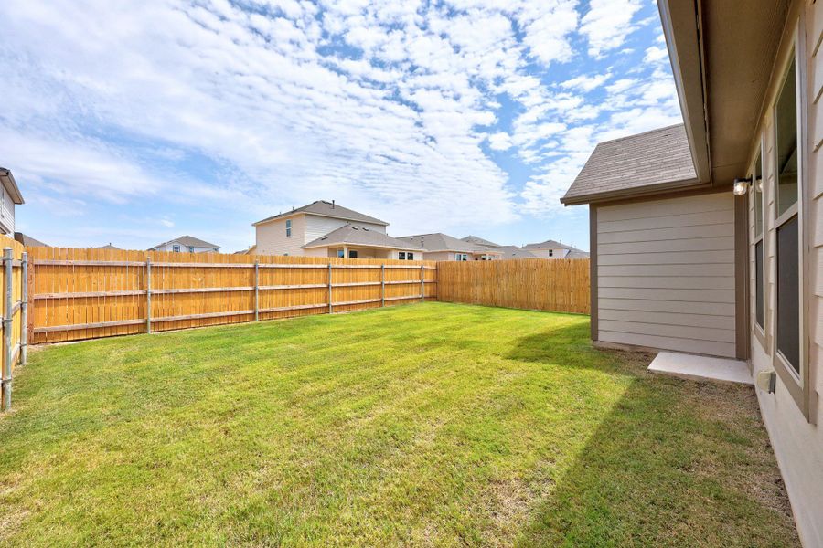 Exterior details and patio area of a home in Trinity Ranch, Elgin (Image 4).