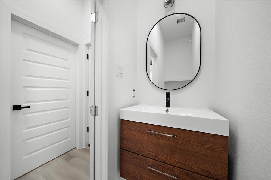 1st Floor: Half-Bath (Representative Photo)