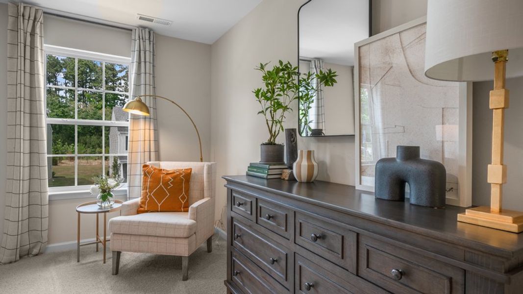 Furnished interior view inside a new home in The Preserve at Kinsley, Jamestown (Image 28).