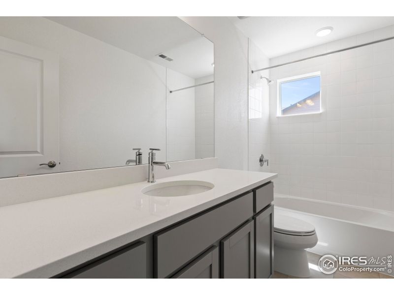 Furnished interior view inside a new home in Trailside on Harmony, Timnath (Image 7).