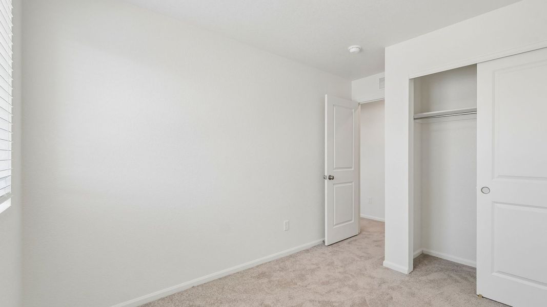 Spacious, unfurnished interior of a new home in Banning Lewis Ranch, Colorado Springs (Image 24).