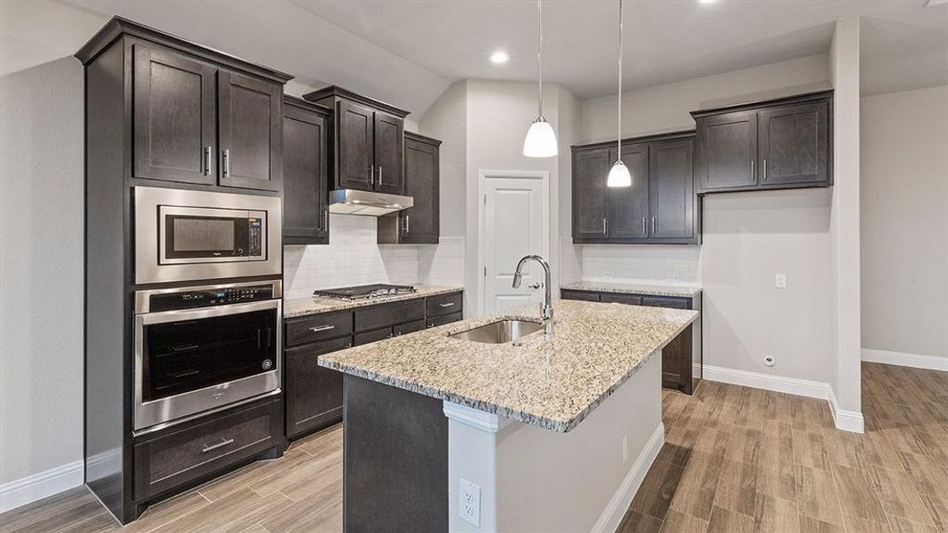 Kitchen - All Home and community information, including pricing, included features, terms, availability and amenities, are subject to change at any time without notice or obligation. All Drawings, pictures, photographs, video, square footages, floor plans, elevations, features, colors and sizes are approximate for illustration purposes only and will vary from the homes as built.