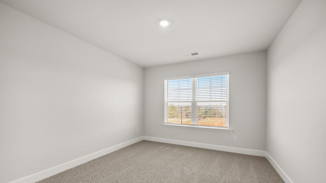 Representative unfurnished interior of a home built from the Packard by D.R. Horton in Evergreen Crossing, Locust Grove (Image 30).