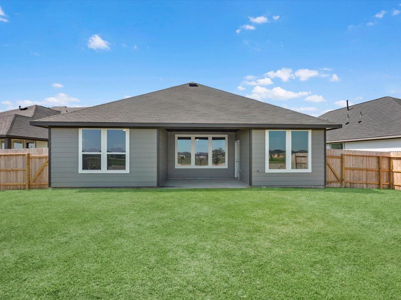Exterior details and patio area of a home in Mason Woods, Cypress (Image 3).