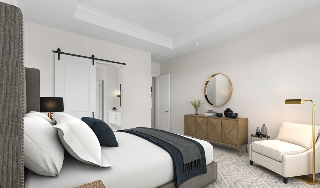 Primary suite with barn door to primary bath