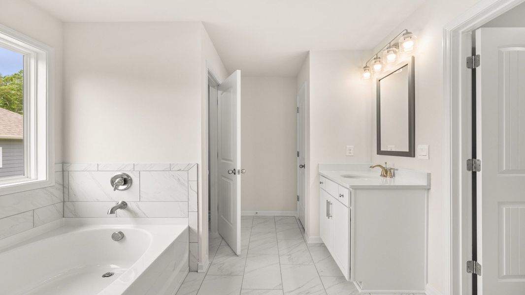 Representative furnished interior of a home built from the GRAYSON by D.R. Horton in Butner Estates, South Fulton (Image 11).