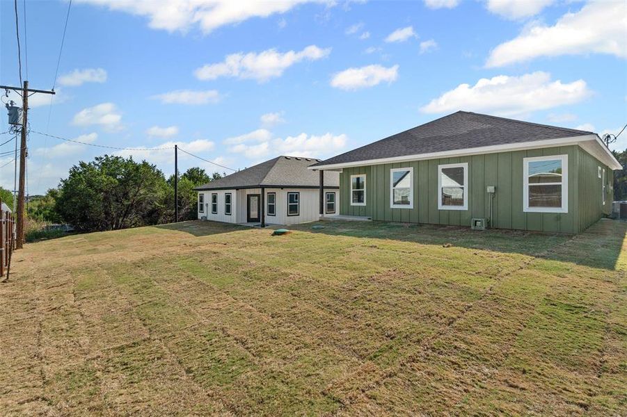 Exterior details and patio area of a home in , Granbury (Image 25).