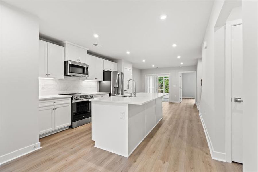 Furnished interior view inside a new home in Hope Pointe Townhomes, North Myrtle Beach (Image 2).