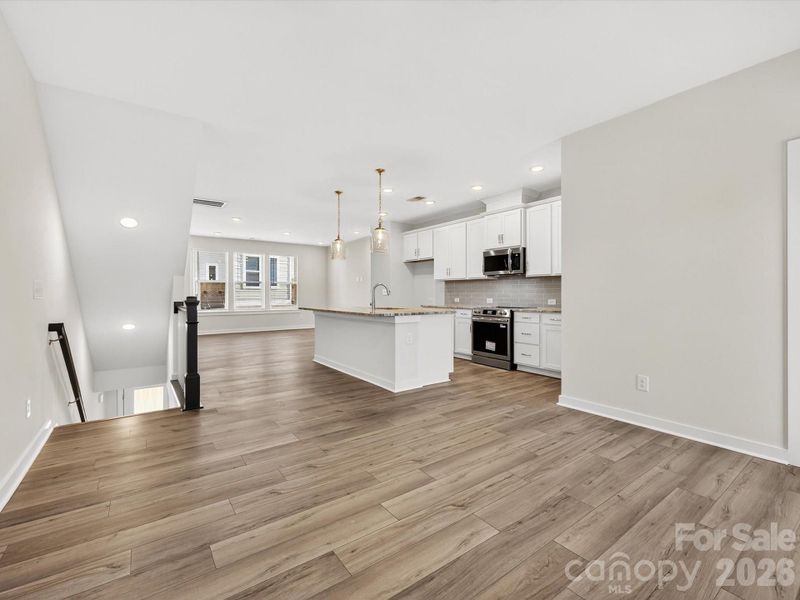 Spacious, unfurnished interior of a new home in Central Living at Craig, Charlotte (Image 12).