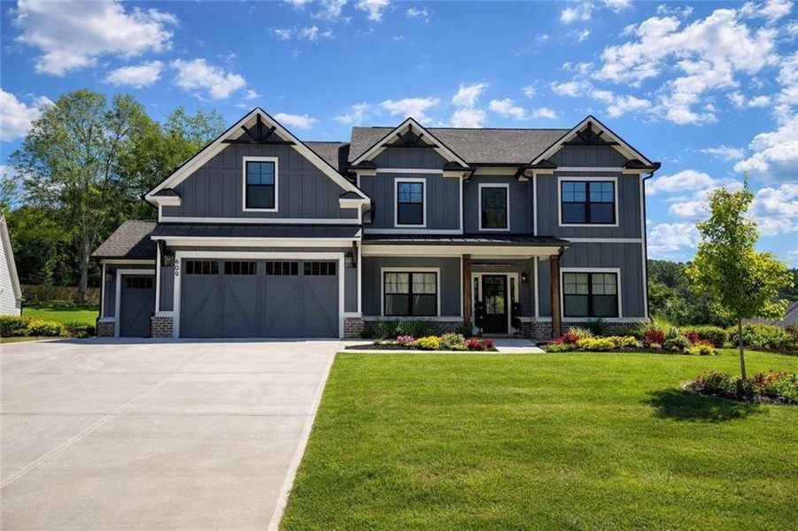 Front exterior of a new home in Spring Creek, Monroe, GA, highlighting curb appeal (Image 22).