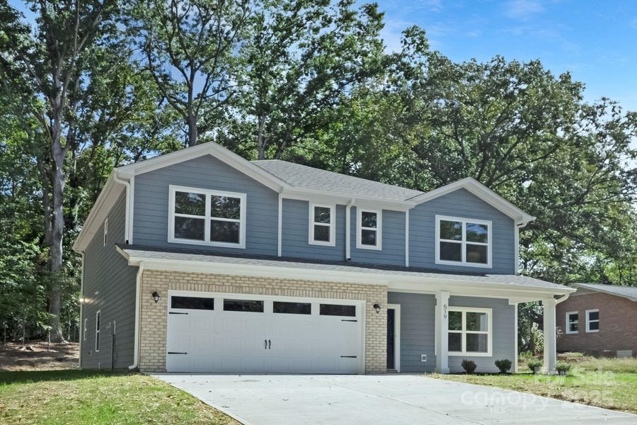 Front exterior of a new home in , Waxhaw, NC, highlighting curb appeal (Image 2).