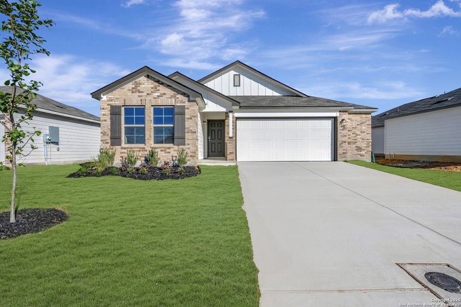 Front exterior of a new home in Greenspoint Heights, Seguin, TX, highlighting curb appeal (Image 19).