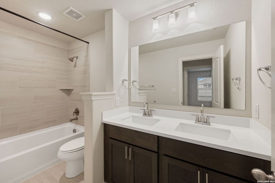 Furnished interior view inside a new home in Veramendi, New Braunfels (Image 14).