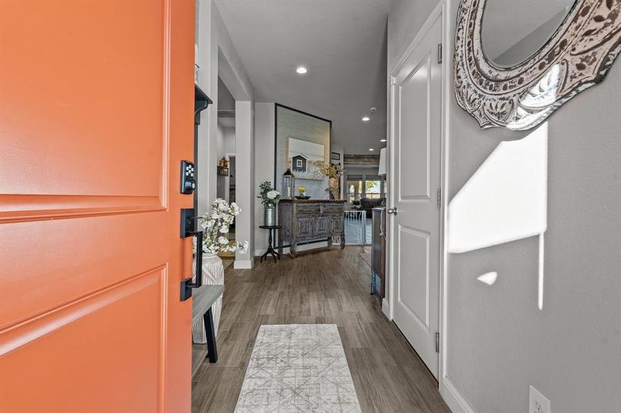 Corridor featuring dark wood-type flooring