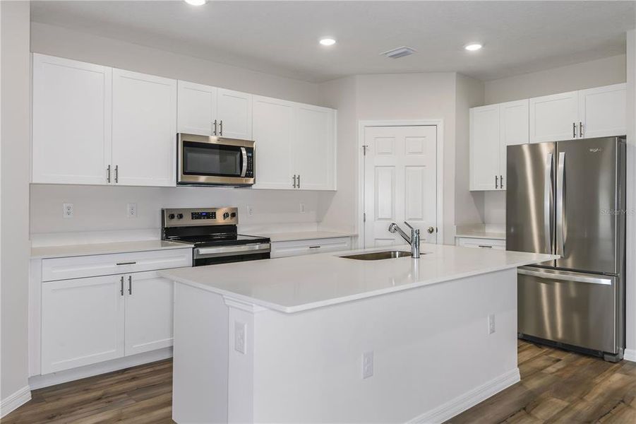 Furnished interior view inside a new home in Pasadena Woods, Dade City (Image 8).