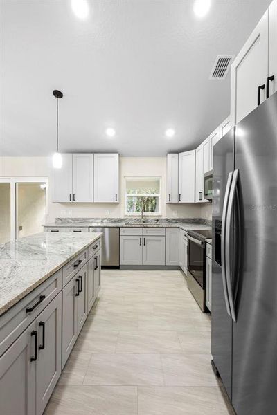 Furnished interior view inside a new home in , Deland (Image 9).