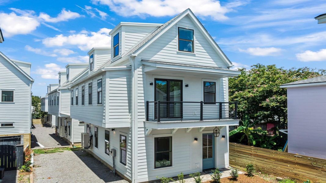 Front exterior of a new home in Grants Court, Charleston, SC, highlighting curb appeal (Image 1).