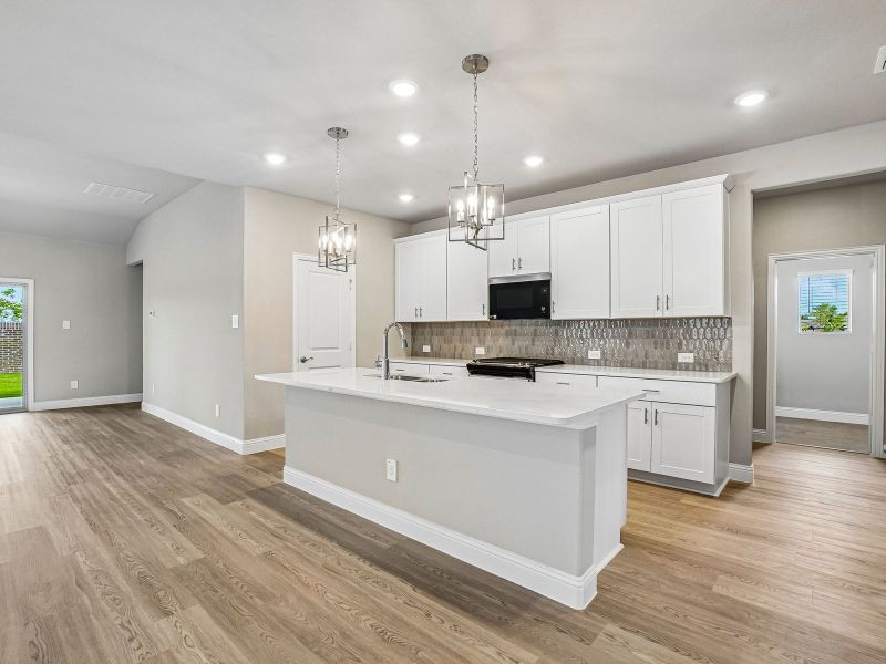 Furnished interior view inside a new home in Eastridge - Signature Series, McKinney (Image 6).