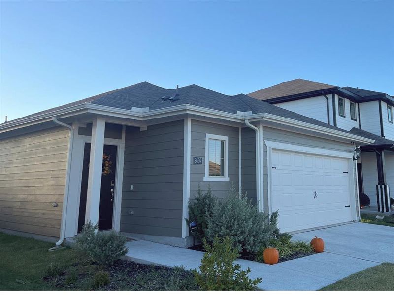 Single story home with a garage