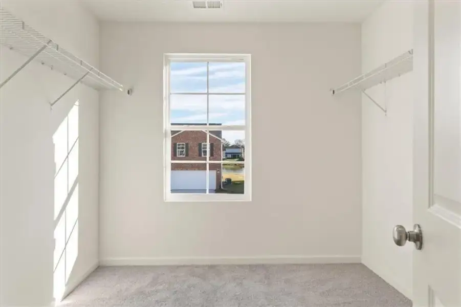 Spacious, unfurnished interior of a new home in The Ridge at Twin Rivers, Covington (Image 22).