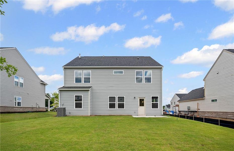Exterior details and patio area of a home in Hawthorne Ridge, McDonough (Image 3).
