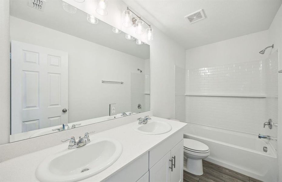 Upgraded secondary bath with premium finishes *real home pictured