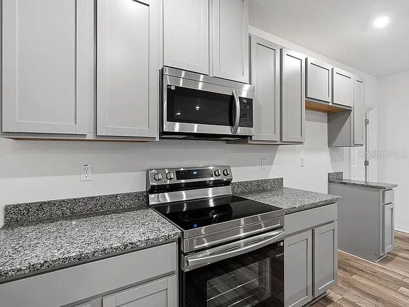 Furnished interior view inside a new home in Royal Highlands, Brooksville (Image 8).