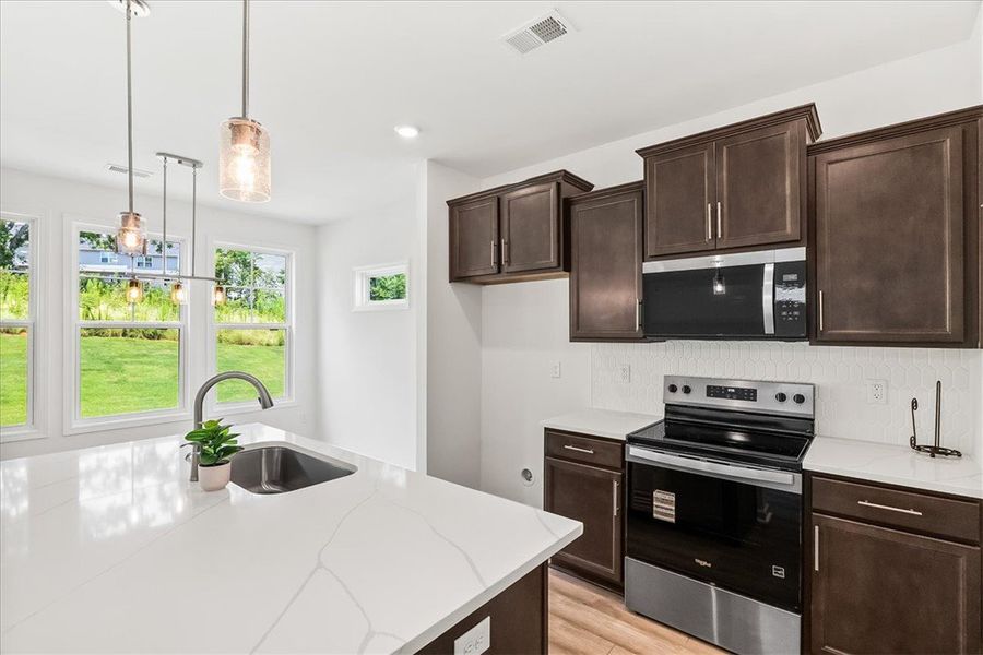 Furnished interior view inside a new home in Brownstone Park, Easley (Image 6).