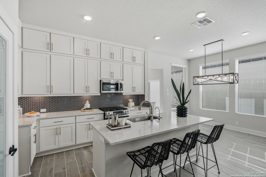 Furnished interior view inside a new home in Centero at Stone Oak, San Antonio (Image 6). Furnished interior view inside a new home in Centero at Stone Oak, San Antonio (Image 6).