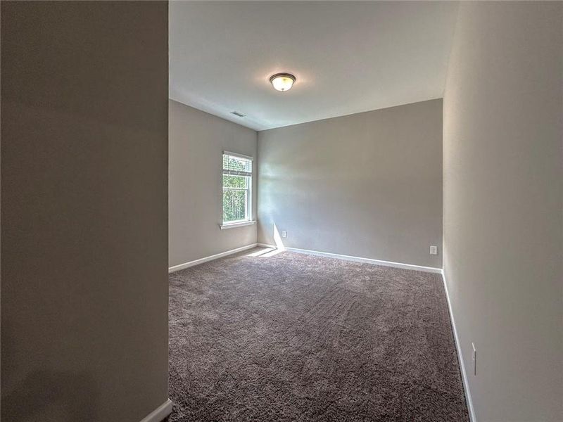 Spacious, unfurnished interior of a new home in Glen at Cave Springs, Douglasville (Image 18).