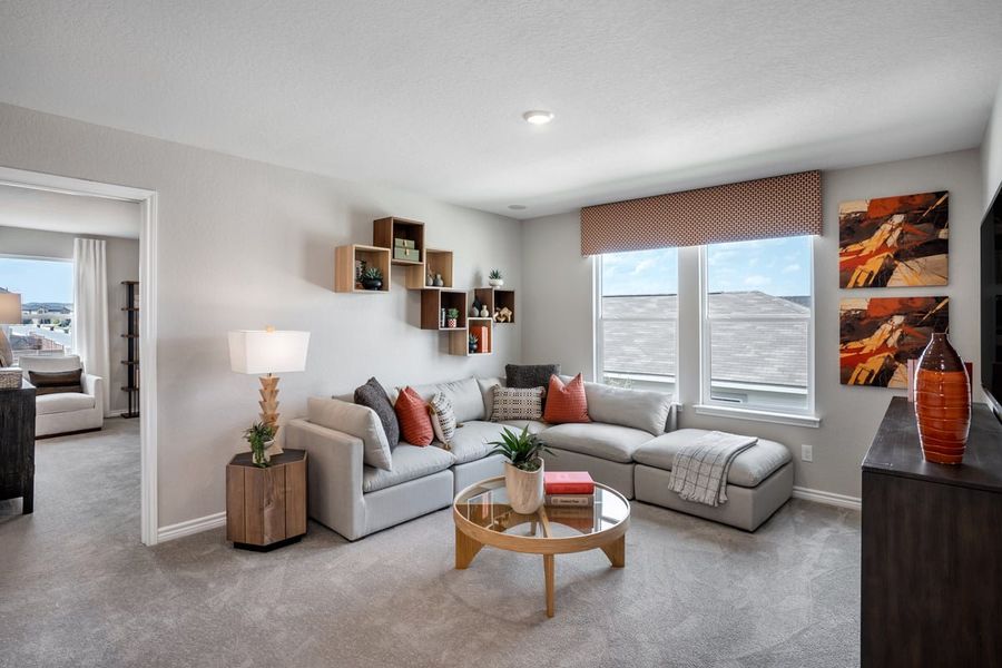 Representative furnished interior of a home built from the 2088 by KB Home in Medina Crossing, Von Ormy (Image 8).