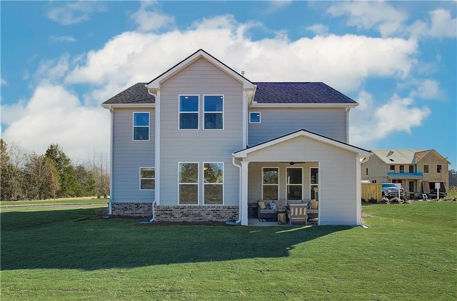 Front exterior of a new home in Cooper Park, McDonough, GA, highlighting curb appeal (Image 21). Front exterior of a new home in Cooper Park, McDonough, GA, highlighting curb appeal (Image 21).