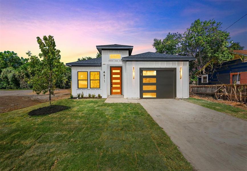Front exterior of a new home in , Dallas, TX, highlighting curb appeal (Image 18).