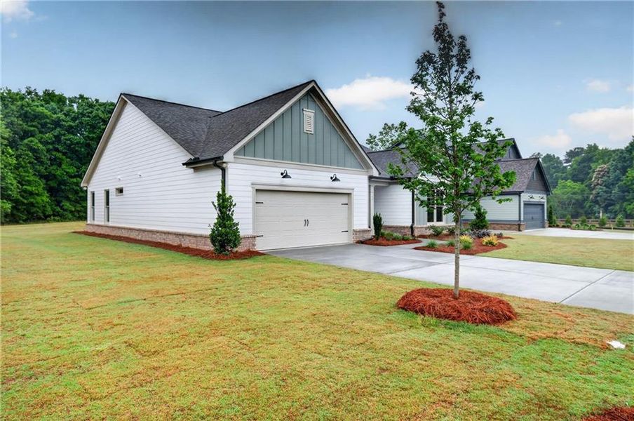 Front exterior of a new home in , Winder, GA, highlighting curb appeal (Image 16). Front exterior of a new home in , Winder, GA, highlighting curb appeal (Image 16).