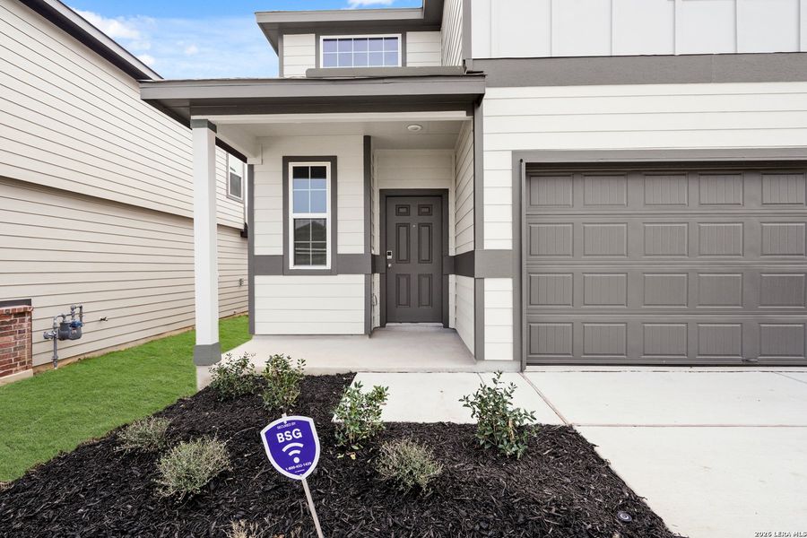 Exterior details and patio area of a home in Hickory Ridge, Elmendorf (Image 18).