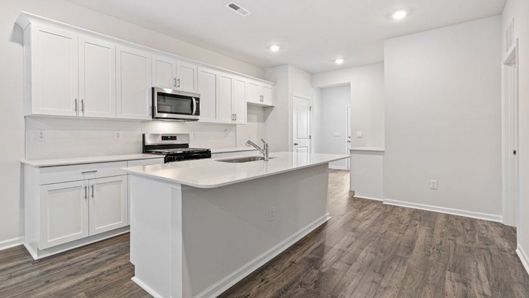 Representative furnished interior of a home built from the HAYWOOD by D.R. Horton in The Villas at Haywood Glen, Knightdale (Image 11).