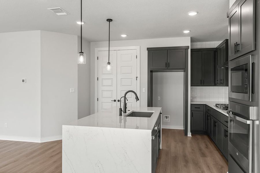 Furnished interior view inside a new home in Terrace Collection at Lariat, Liberty Hill (Image 9). Furnished interior view inside a new home in Terrace Collection at Lariat, Liberty Hill (Image 9).