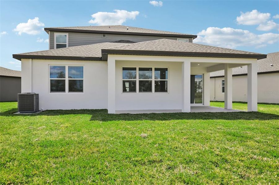 Exterior details and patio area of a home in Magnolia Bay - Reserve Series, Nokomis (Image 24).