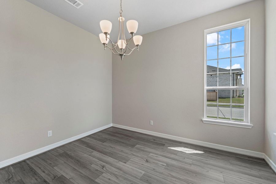 The dining area is a perfect blend of style and functionality, providing an inviting space for memorable meals and gatherings. The dining area is a perfect blend of style and functionality, providing an inviting space for memorable meals and gatherings.