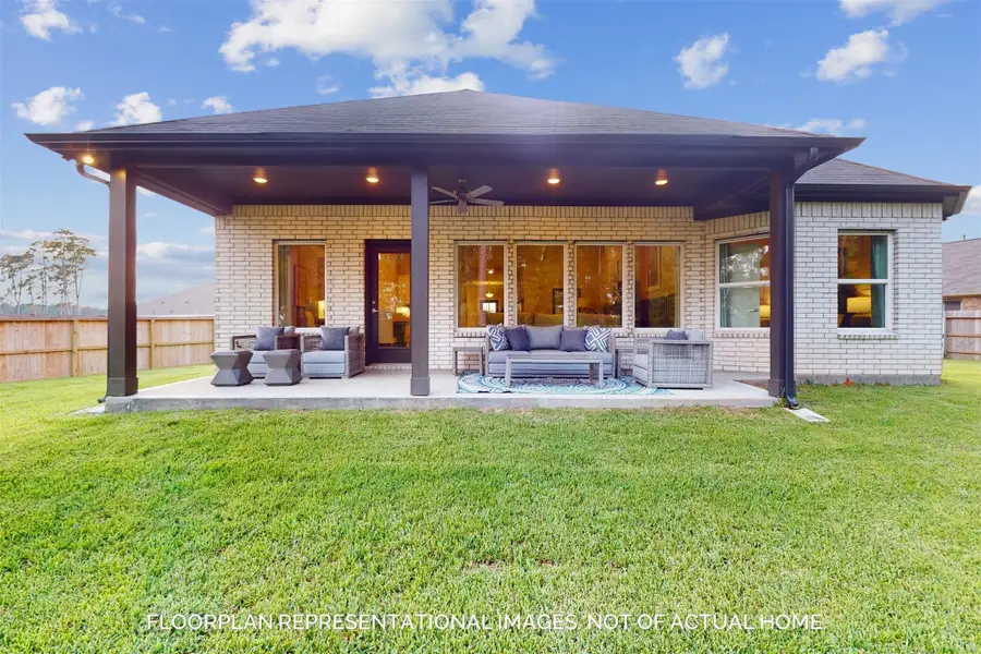 Exterior details and patio area of a home in Pinewood at Grand Texas, New Caney (Image 2).