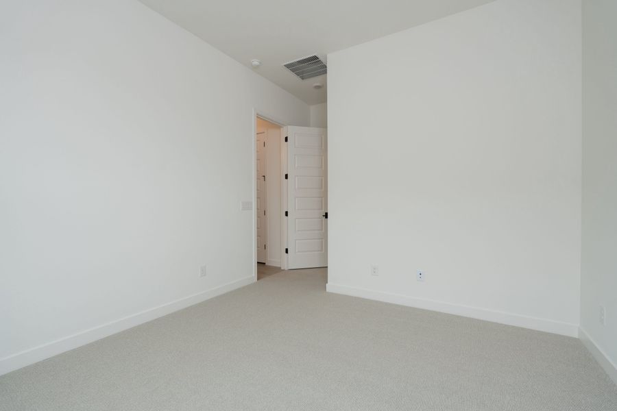 Spacious, unfurnished interior of a new home in Waterston Central, Gilbert (Image 14).