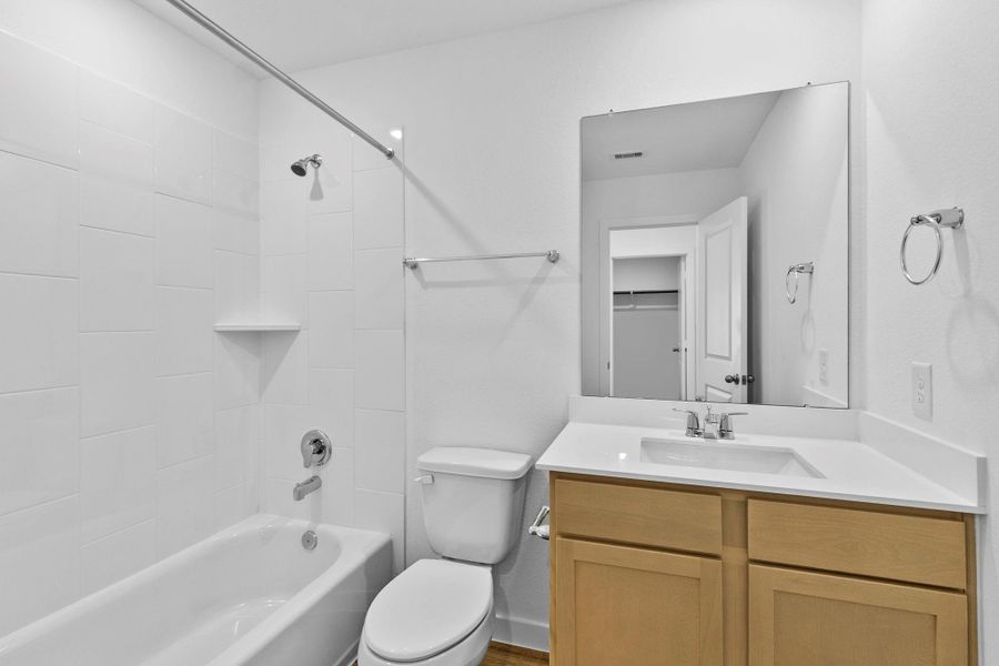 Furnished interior view inside a new home in Grand West, Houston (Image 11).