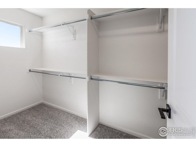 MASTER BEDROOM WALK IN CLOSET