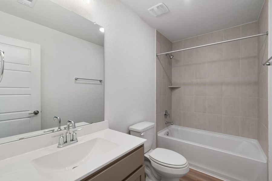 Furnished interior view inside a new home in Lone Star Landing, Montgomery (Image 18).