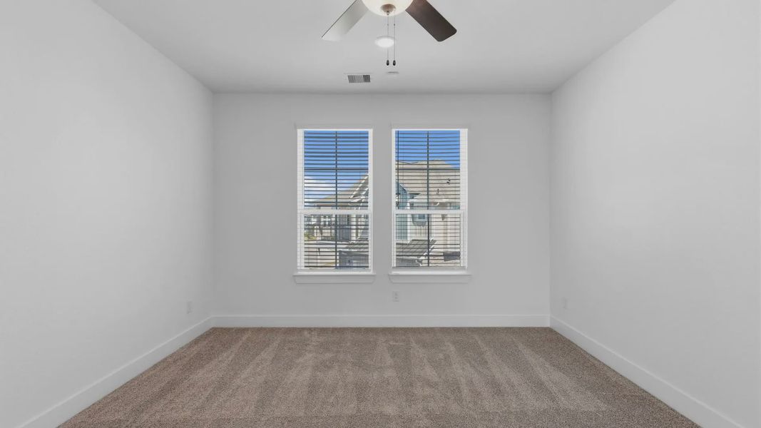 Representative unfurnished interior of a home built from the Oakdale by Chesmar Homes in Bridgeland Courtyard, Cypress (Image 19).