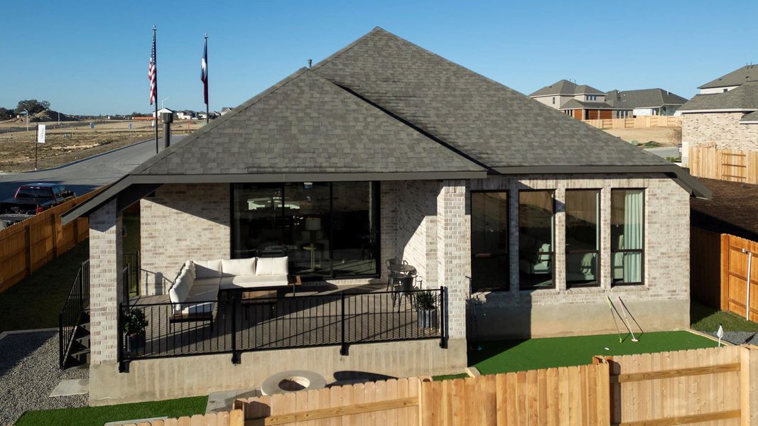 Exterior details and patio area of a home in Lariat 50', Liberty Hill (Image 2).
