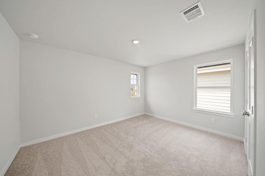 Spacious, unfurnished interior of a new home in Sunterra, Katy (Image 20).