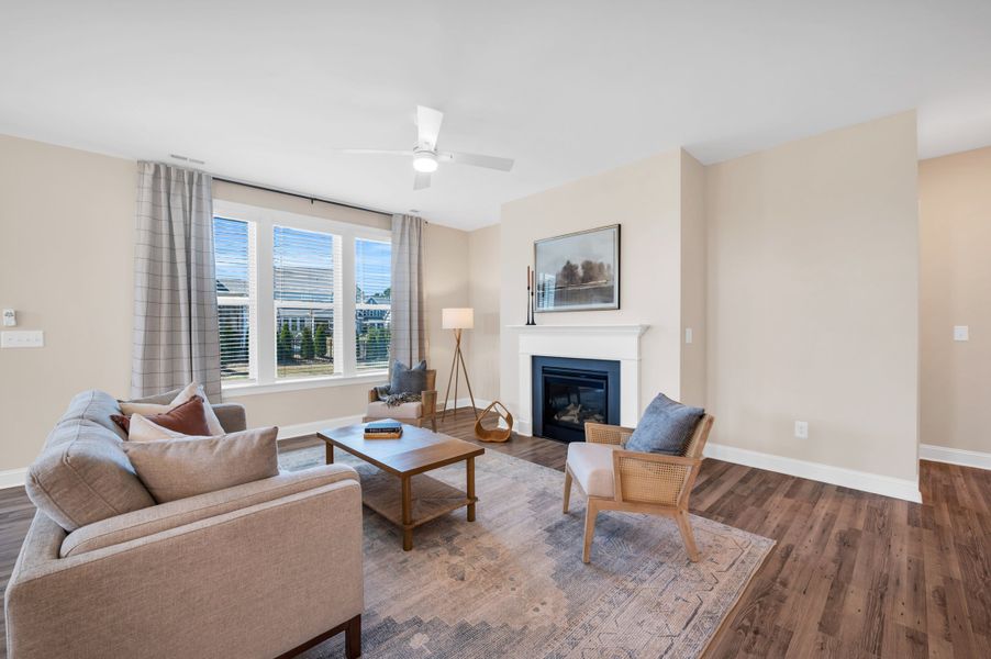 Representative furnished interior of a home built from the The Amherst by RobuckHomes in Windwater, Hampstead (Image 40).